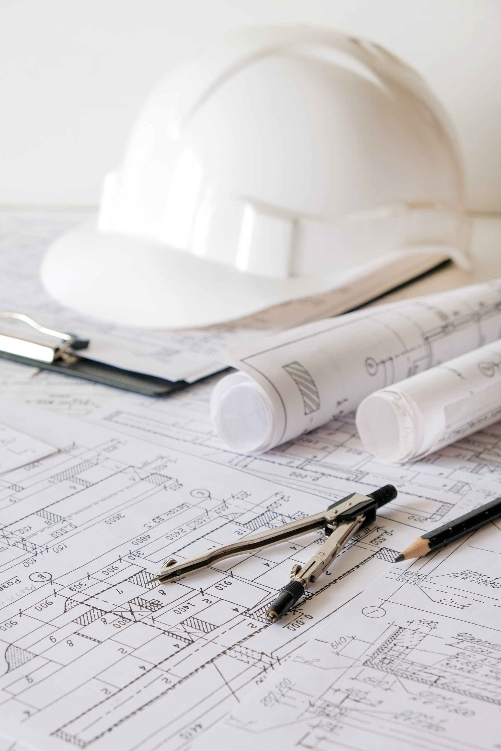 Architects concept,eco project house,Retrofit movement,engineer architect designer working drawing sketch plans blueprints and making construction eco model