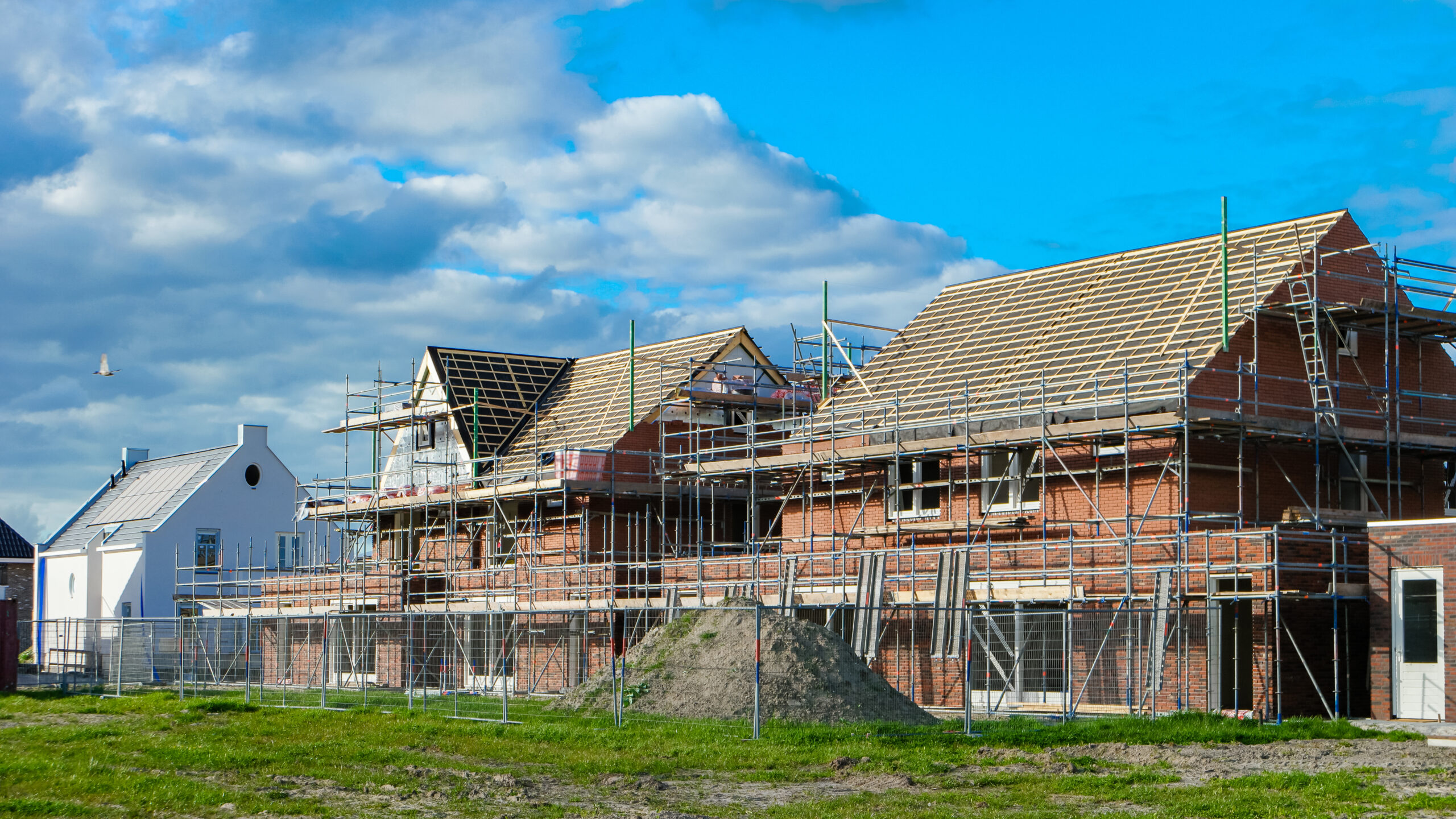 construction site of building a new house,Dutch Suburban area with modern family houses, newly build modern family homes in the Netherlands, dutch family houses,