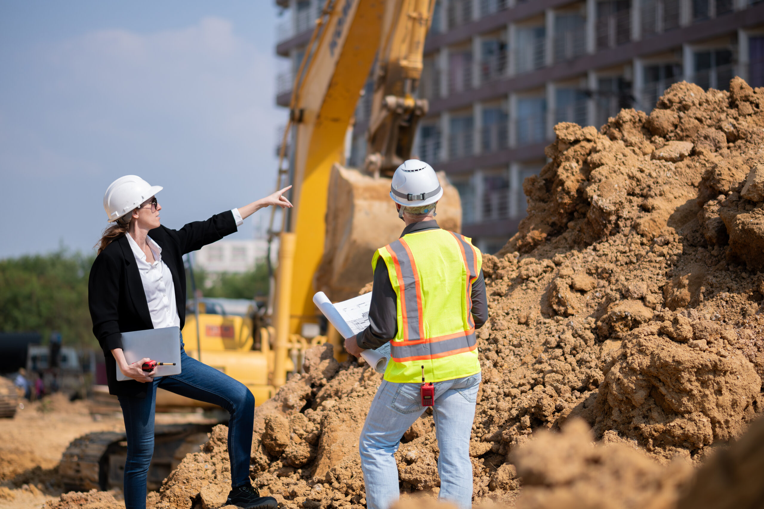 Construction Project Cost Planner - People on building site